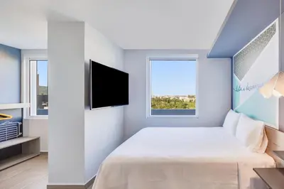 Cama o camas de una habitación en One Mazatlán