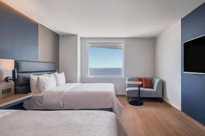Cama o camas de una habitación en Fiesta Inn Mazatlán
