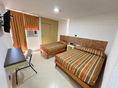 Cama o camas de una habitación en HOTEL SALVADOR