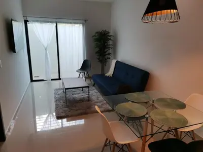 Zona de estar de Departamento a dos cuadras de la playa