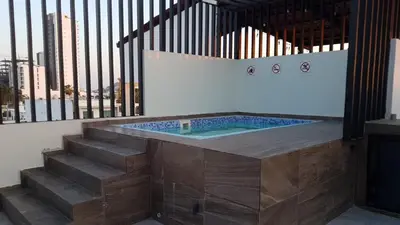Piscina en o cerca de Departamento a dos cuadras de la playa