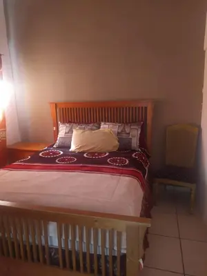 Cama o camas de una habitación en Departamento familiar accesible , cerca del consulado y centros comerciales