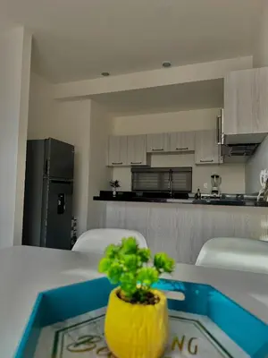 Una cocina o zona de cocina en Torre Q Mazatlán - Departamento cerca del malecón de Mazatlán