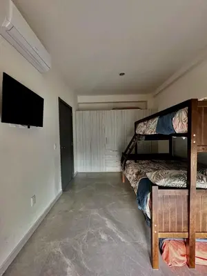 Cama o camas de una habitación en Torre Q Mazatlán - Departamento cerca del malecón de Mazatlán