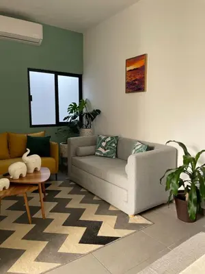 Zona de estar de El Departamento Playa Sur