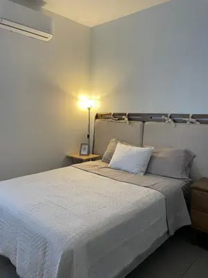 Cama o camas de una habitación en El Departamento Playa Sur