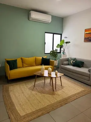 Zona de estar de El Departamento Playa Sur