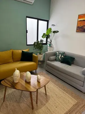 Zona de estar de El Departamento Playa Sur