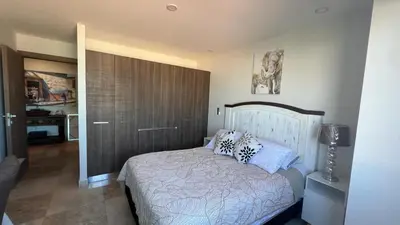 Cama o camas de una habitación en Mar Laguna Hotel