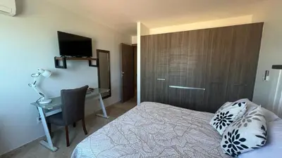 Cama o camas de una habitación en Mar Laguna Hotel