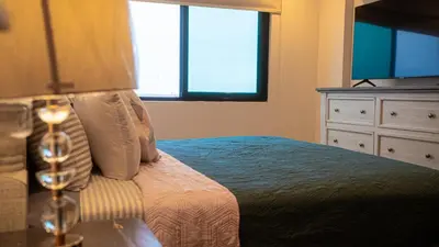 Cama o camas de una habitación en Mar Laguna Hotel