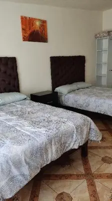 Cama o camas de una habitación en ApartADE