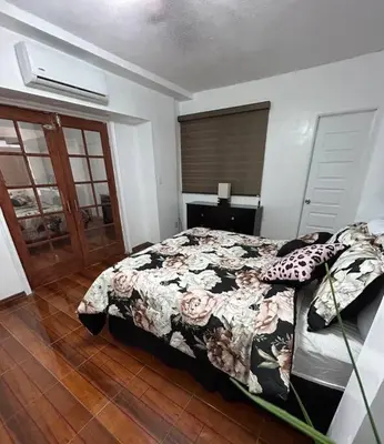 Cama o camas de una habitación en Departamento totalmente equipado
