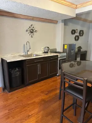 Una cocina o zona de cocina en Departamento totalmente equipado