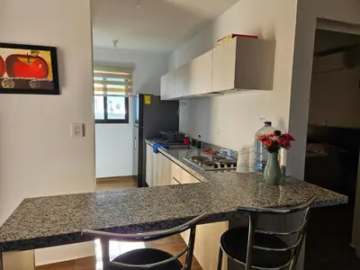 Una cocina o zona de cocina en Ancla 201 Departamento Familiar
