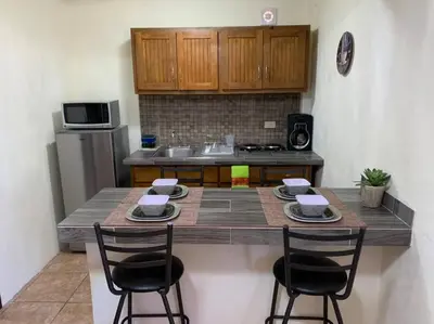 Una cocina o zona de cocina en Casa del Carmen, hermoso departamento en Loreto