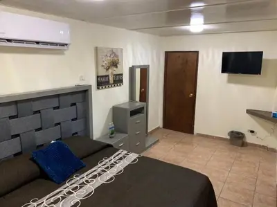 Una televisión o centro de entretenimiento en Casa del Carmen, hermoso departamento en Loreto