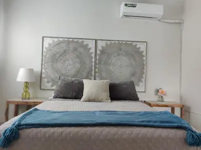 Cama o camas de una habitación en Divino depa remodelado, tranquilo y centrico.