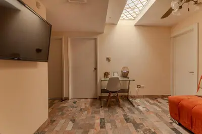 Una televisión o centro de entretenimiento en Casa Elefante hermosa y Centrica