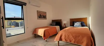 Cama o camas de una habitación en New Luxury Condo