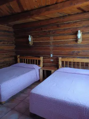 Cama o camas de una habitación en Parador Arew 1 La Energa Que Impulsa El Alma