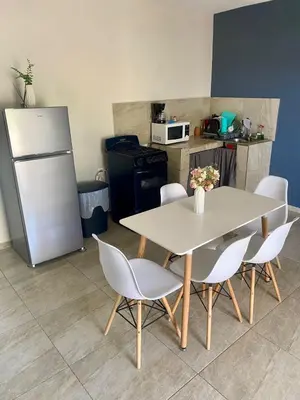 Una cocina o zona de cocina en Departamento Piso 2