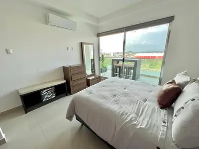 Cama o camas de una habitación en The One D12 Sobre el Malecón Vista al Estadio de Baseball