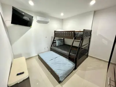 Cama o camas de una habitación en The One D12 Sobre el Malecón Vista al Estadio de Baseball