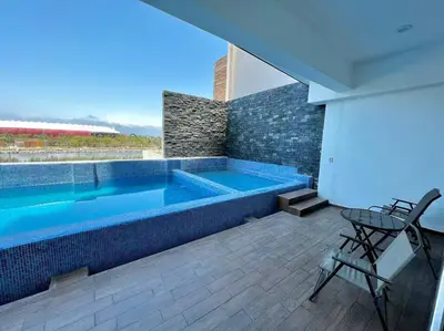 Piscina en o cerca de The One D12 Sobre el Malecón Vista al Estadio de Baseball