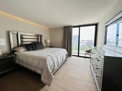Cama o camas de una habitación en En Malecón con vista al mar y lago by G P S rentas