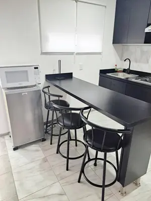 Una cocina o zona de cocina en Blanco Sereno - Depto 2 - 2 Min Malecón