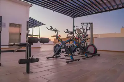 Gimnasio o instalaciones de fitness de Beautiful condo with 4 pools and roofgarden