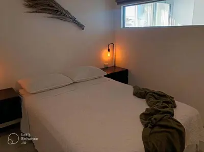 Cama o camas de una habitación en Increíble departamento en malecón frente al mar