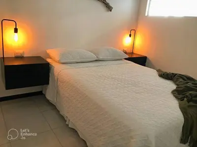 Cama o camas de una habitación en Increíble departamento en malecón frente al mar