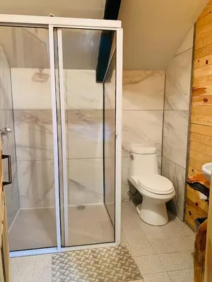 Un baño de Rimusa Inn