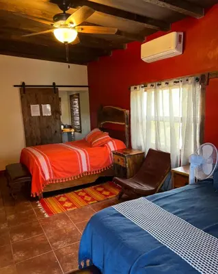 Cama o camas de una habitación en Casa Concepcion Suites