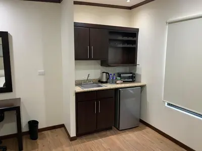 Una cocina o zona de cocina en Hotel Los Arcos