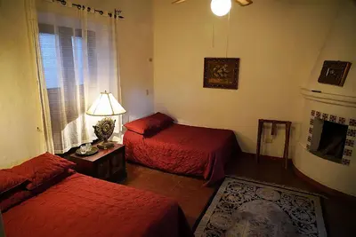 Cama o camas de una habitación en Hotel la Mansión