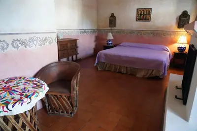 Cama o camas de una habitación en Hotel la Mansión
