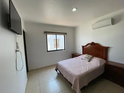 Cama o camas de una habitación en Excelente Casa y Cómoda en Cerritos - Residencial Palmilla I