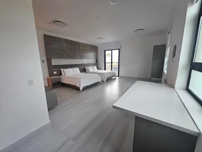 Cama o camas de una habitación en Aventuras Hotel