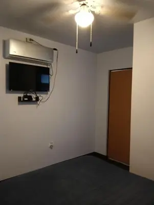 Una televisión o centro de entretenimiento en Hospedaje JrzConsulado