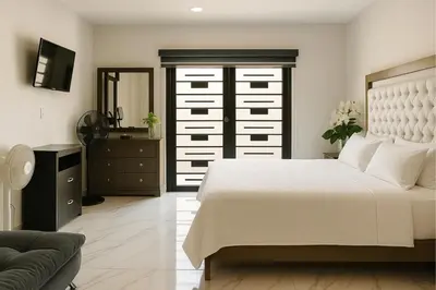 Cama o camas de una habitación en Sunset Suites Mazatlán at Lomas de Mazatlán