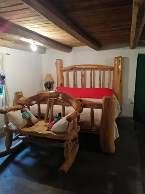 Cama o camas de una habitación en Parque Cueva de los Leones
