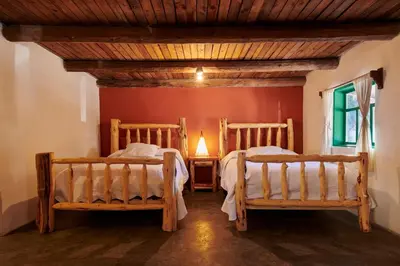Cama o camas de una habitación en Parque Cueva de los Leones
