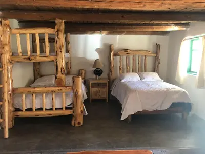 Cama o camas de una habitación en Parque Cueva de los Leones