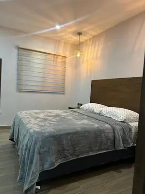 Cama o camas de una habitación en Depa del Carmen