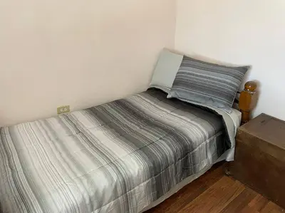 Cama o camas de una habitación en Bonito departamento con dos habitaciones.