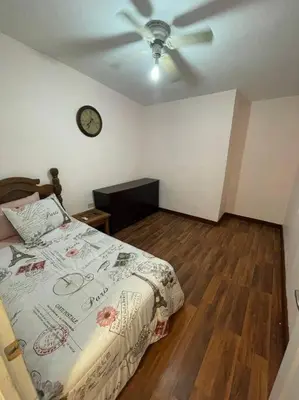 Cama o camas de una habitación en Bonito departamento con dos habitaciones.