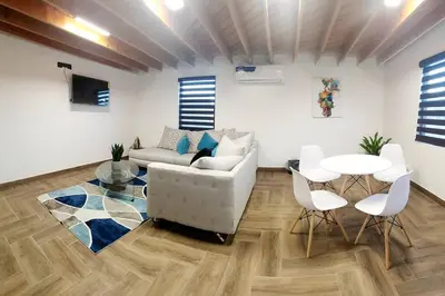 Zona de estar de * Elegante * Departamento Pitagoras 4